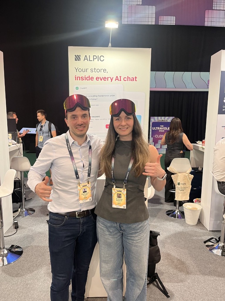 Two Alpic team members with goggles on their foreheads at ShopTalk