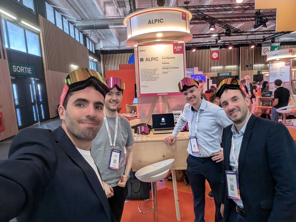 The Alpic team wearing their goggles at the VivaTech booth